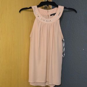 Women’s blouse in Mauve. Size S